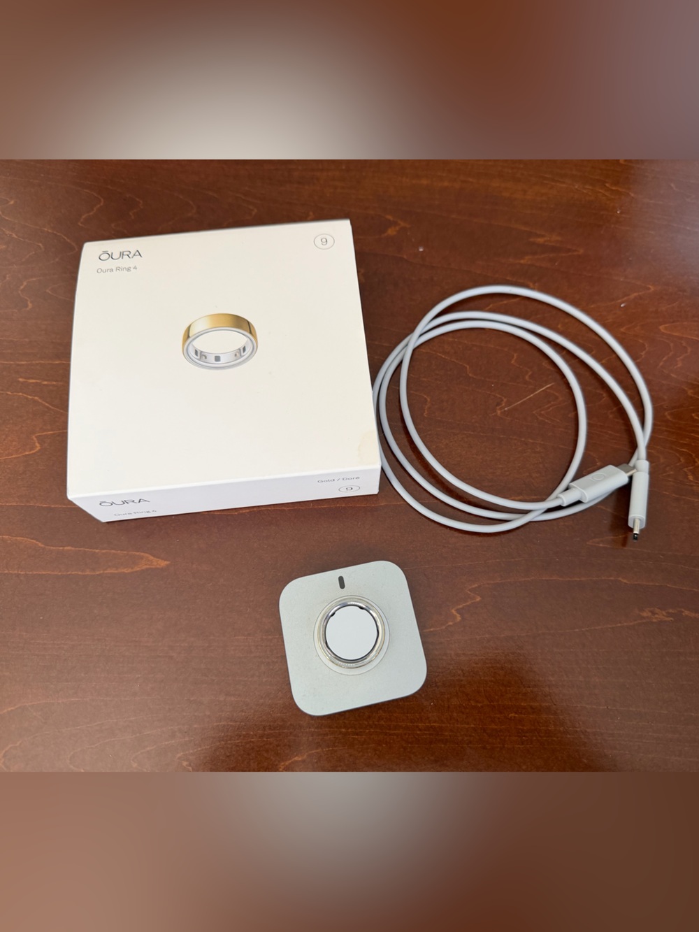 Oura Ring 4 with Charger Dock and USB-C Cable — gold size 9